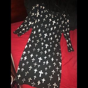 Black dress w/ crosses.